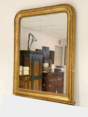 Specchiera Carlo X in foglia oro zecchino . XIX secolo . Restaurata