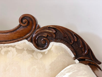 Lombard boat-shaped sofa in walnut Charles X