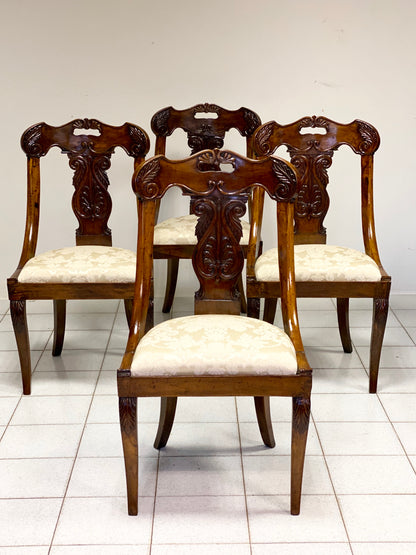 Group of four Lombard Charles X gondola empire chairs. Early 19th century