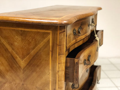 Louis XV chest of drawers with curved front