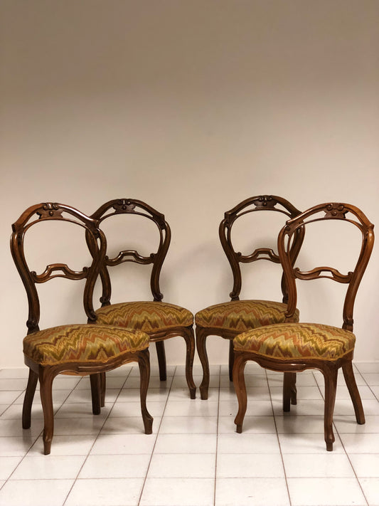 Group of four Lombard walnut chairs, mid 19th century