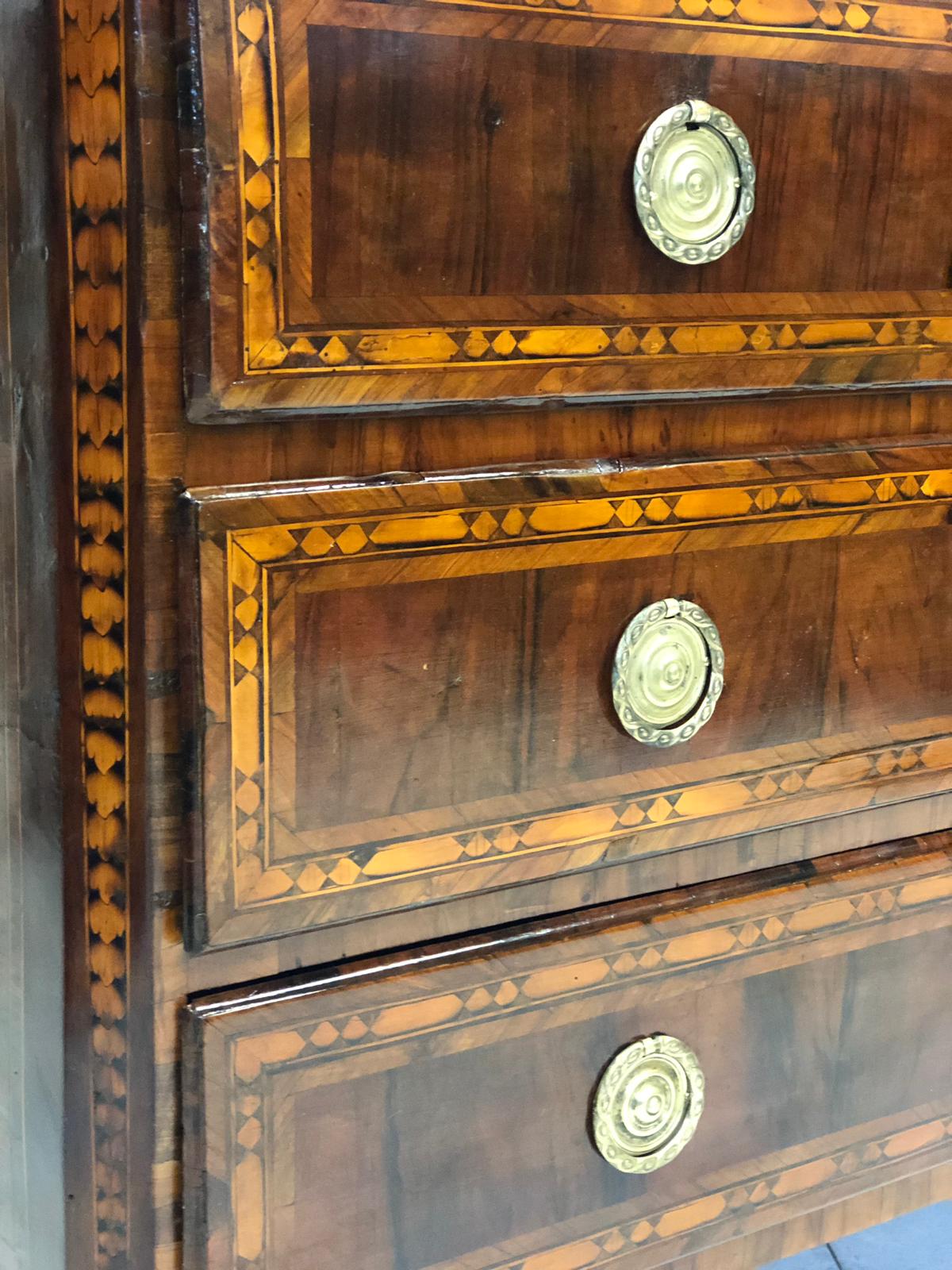 Louis XVI Lombard chest of drawers with figures. 18th century