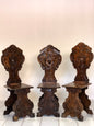 Group of three carved stools. 19th century