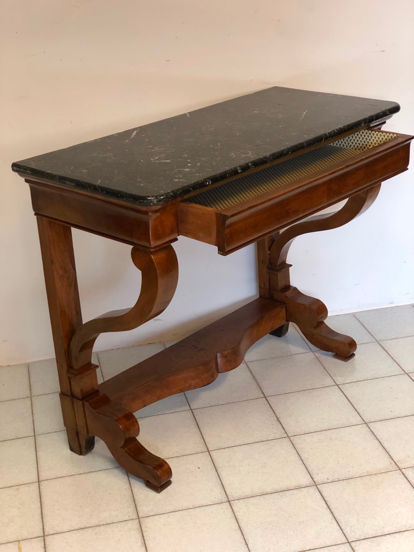 Empire console with braces. 19th century. Restored