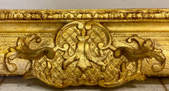 Grande cornice in legno intagliato dorato . XIX secolo
