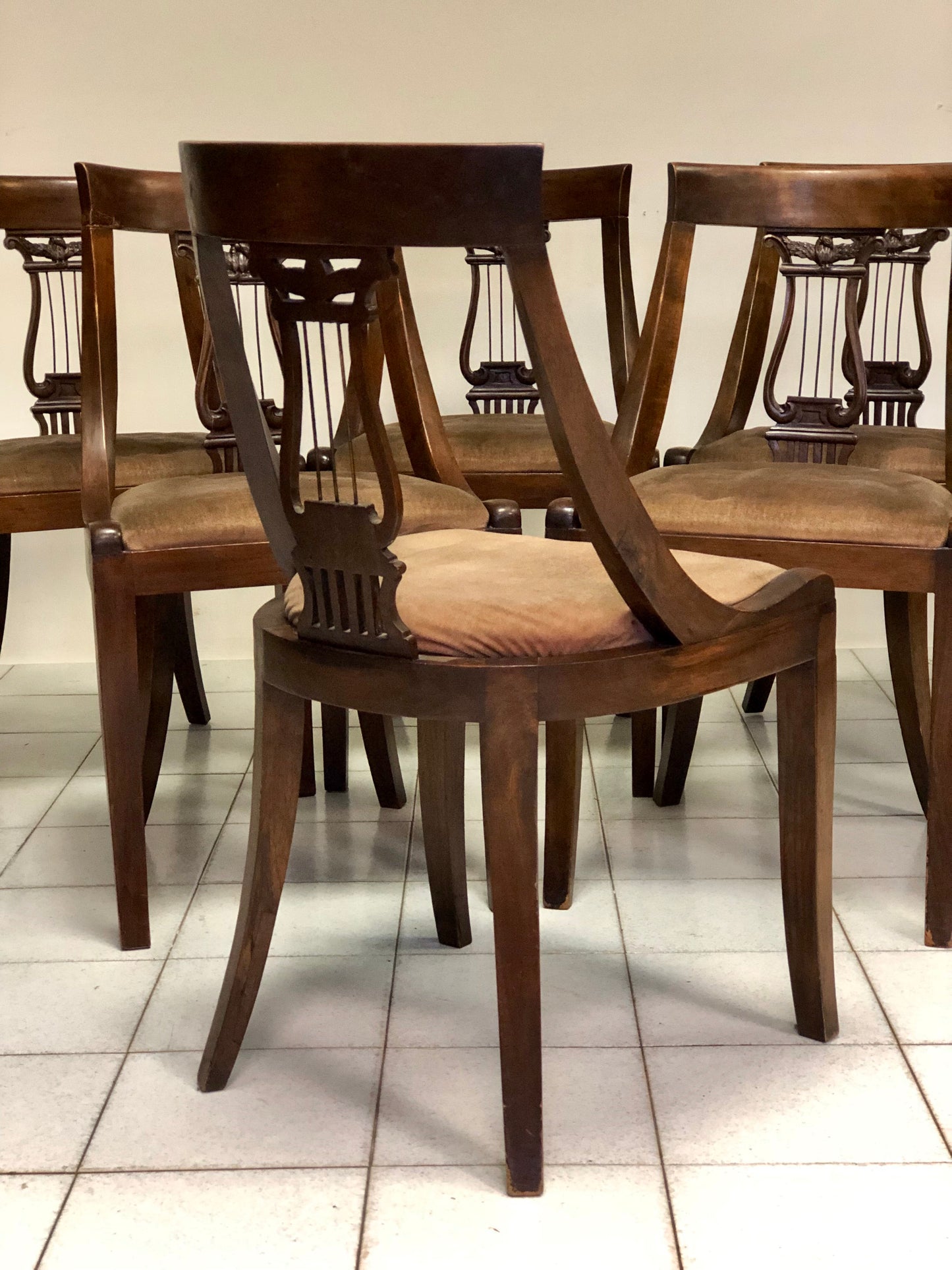 Group of six walnut chairs. Late 19th century