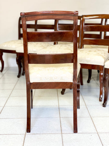 Group of ten Charles X walnut chairs, first half of the 19th century