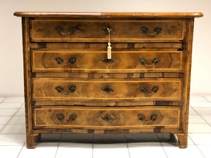 Louis XV chest of drawers with curved front
