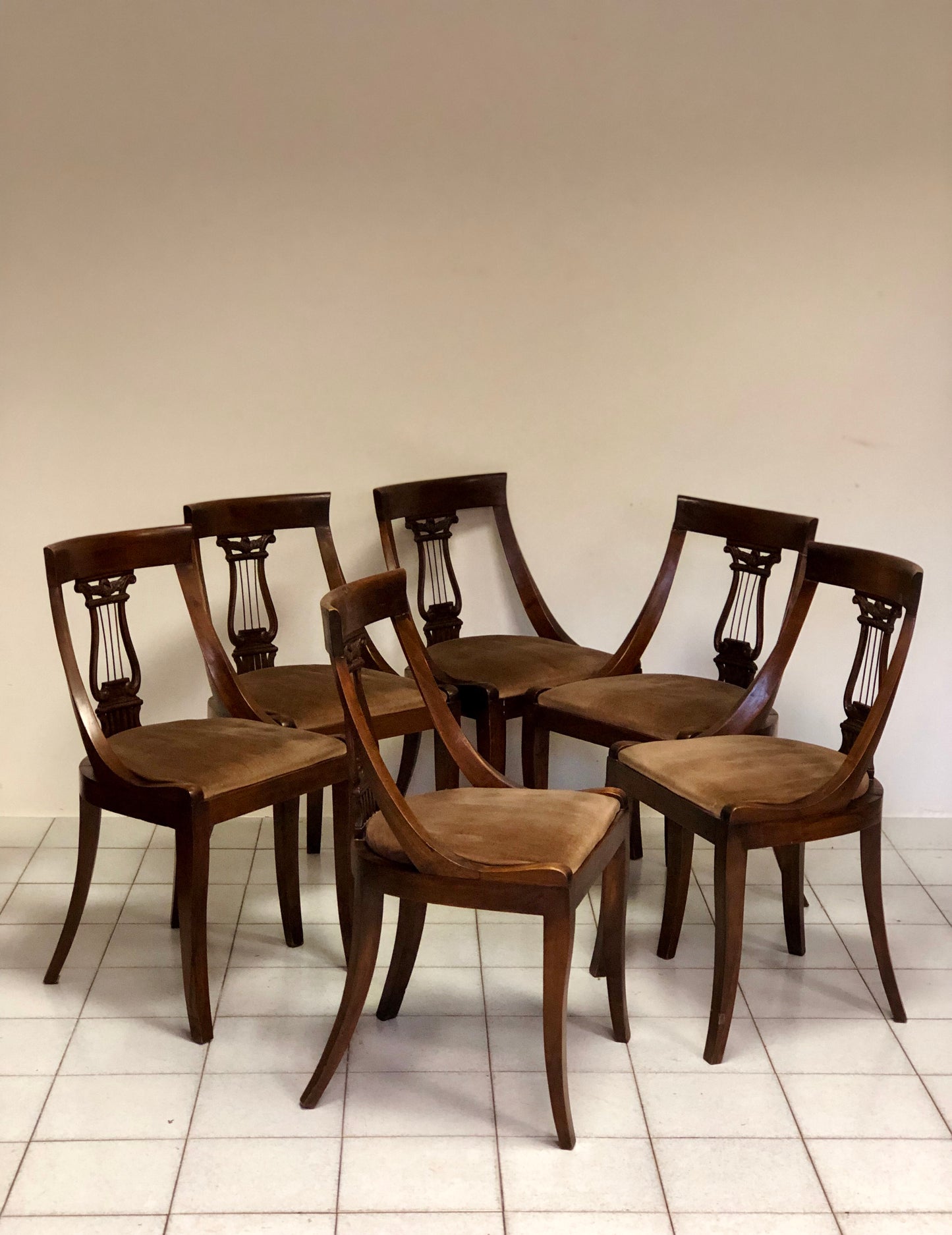 Group of six walnut chairs. Late 19th century
