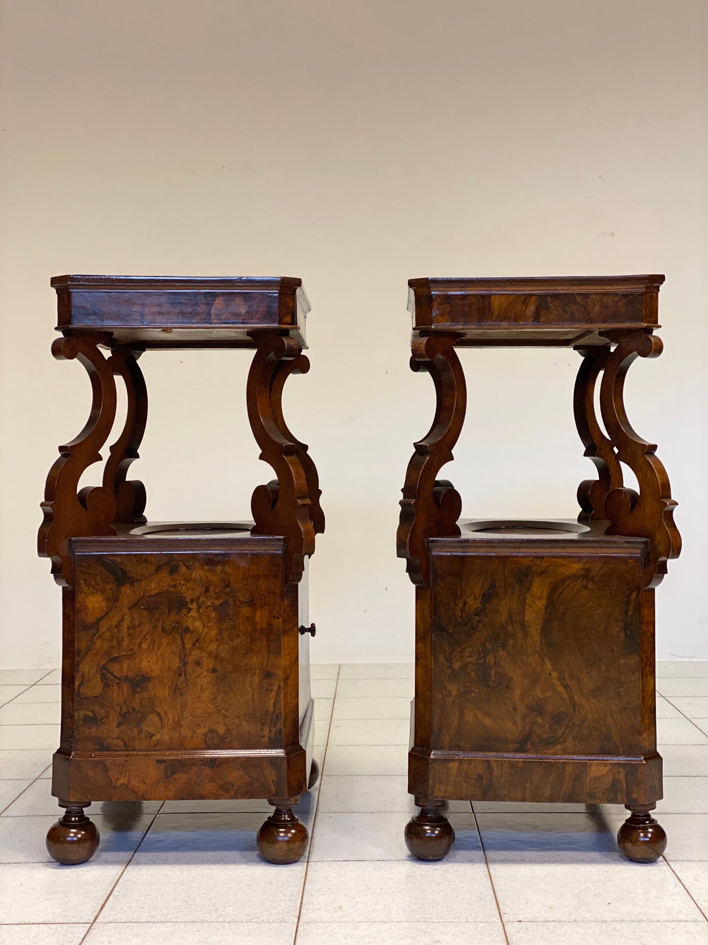 Pair of Lombardi Carlo X rooted centerpiece nightstands