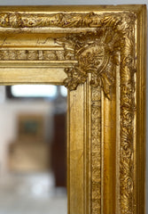 Specchiera lombarda in legno intagliato e dorato metà XIX secolo