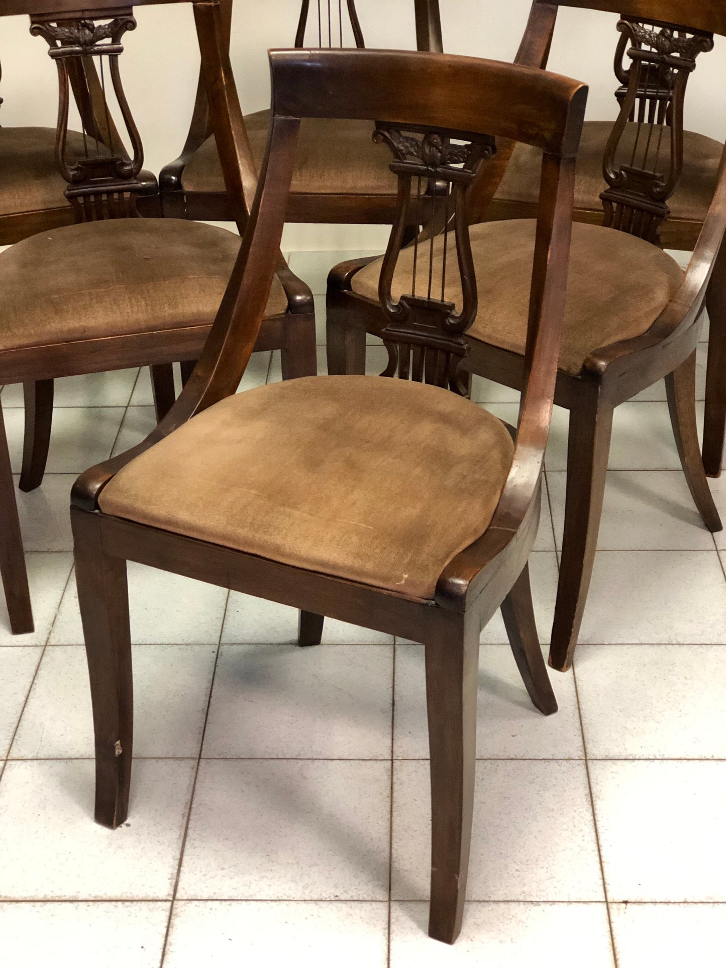 Group of six walnut chairs. Late 19th century
