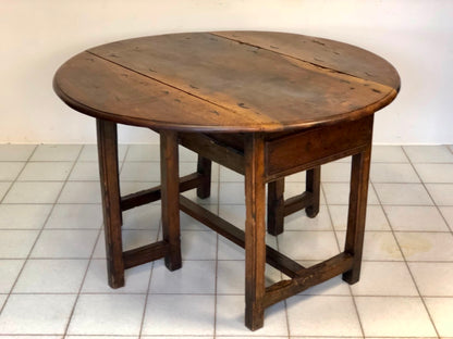 Walnut hinged table. 17th century