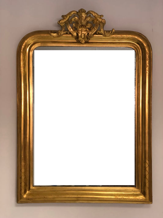 Specchiera in foglia oro zecchino con cimasa traforata
