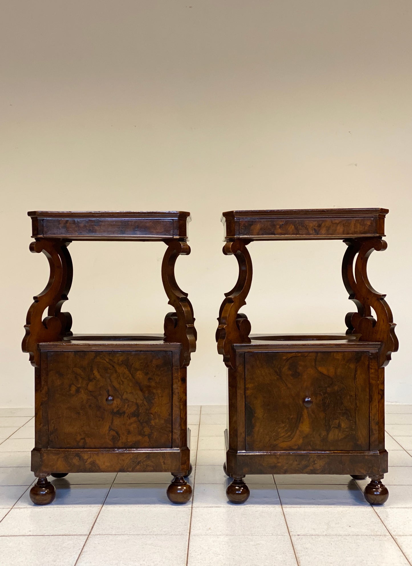 Pair of Lombardi Carlo X rooted centerpiece nightstands