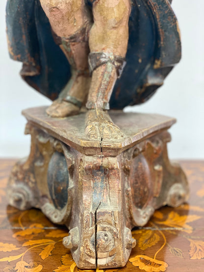 Wooden sculpture Angel holding torch. 17th century Lombardy
