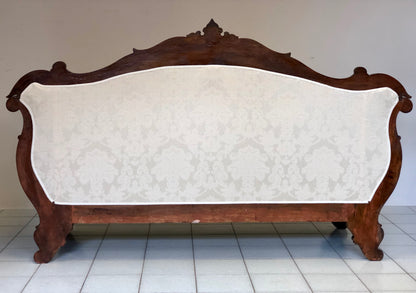 Lombard boat-shaped sofa in walnut Charles X