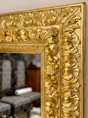 Specchiera lignea intagliata e dorata . Prima metà XIX secolo
