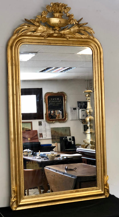 Gilded carved wooden mirror. 19th century