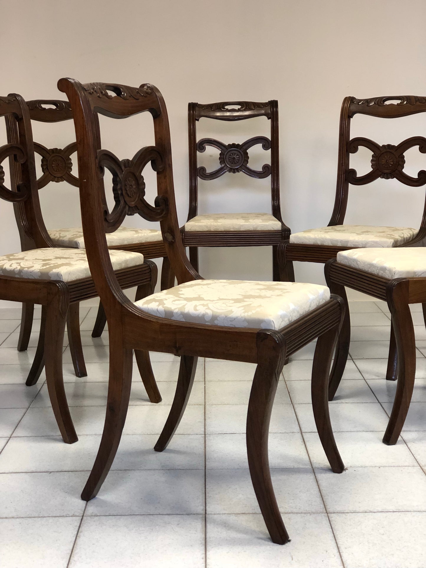 Six Lombard Carlo X walnut chairs