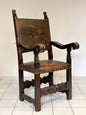Lombard throne in walnut with studs. XVI - XVII century