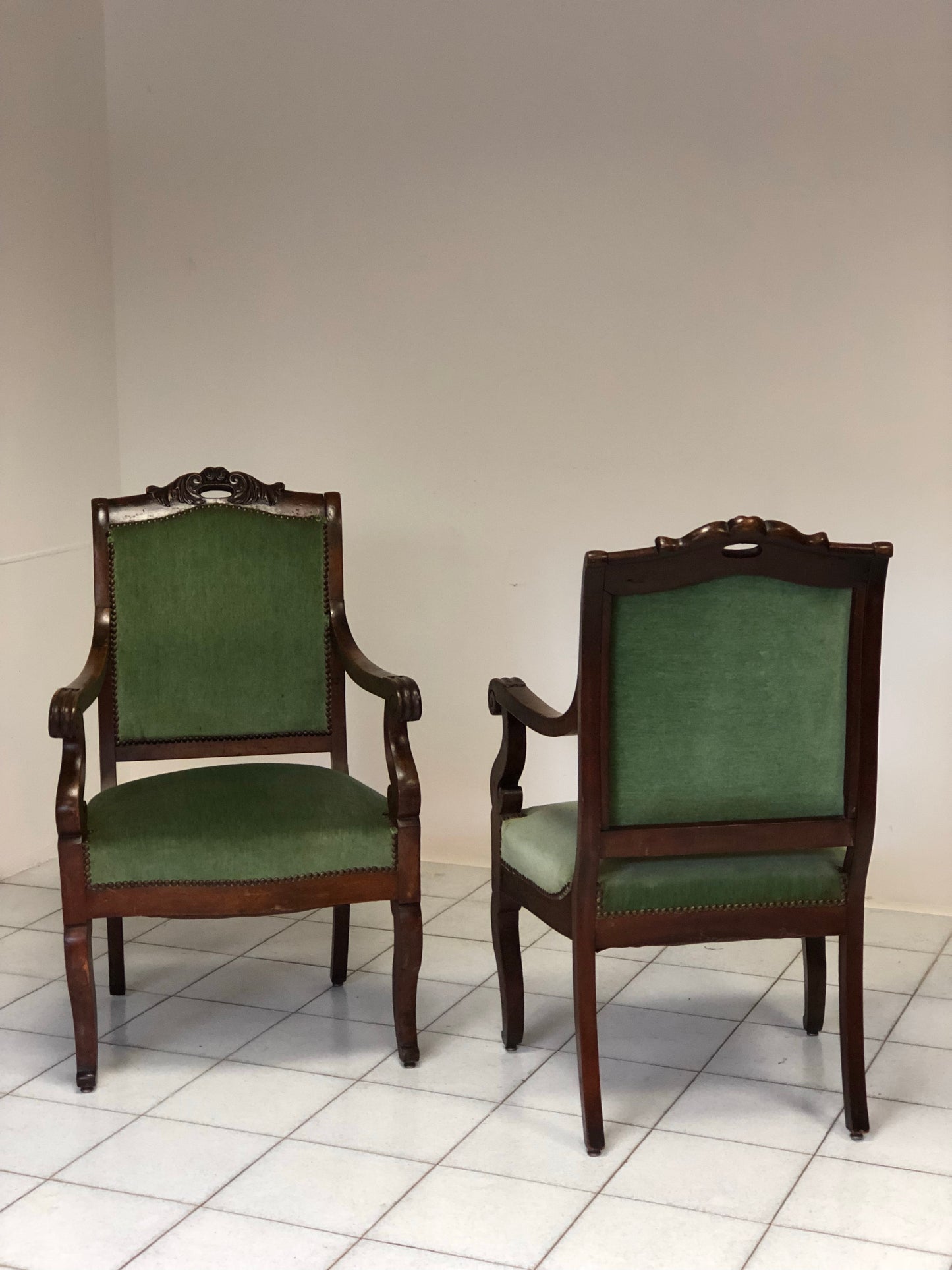 Pair of Lombard Empire Walnut Armchairs. Early 19th Century