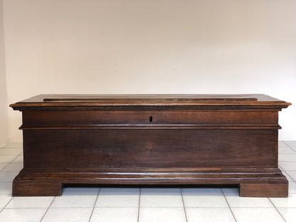 Walnut chest with boss on the top. Bologna 17th century