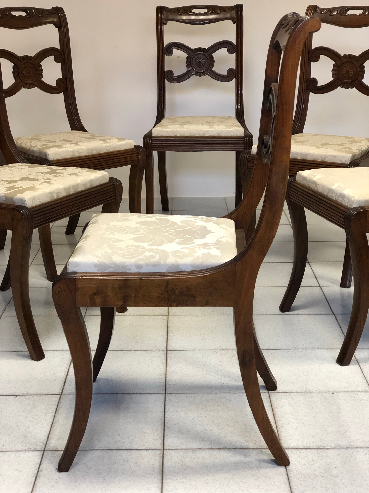 Six Lombard Carlo X walnut chairs
