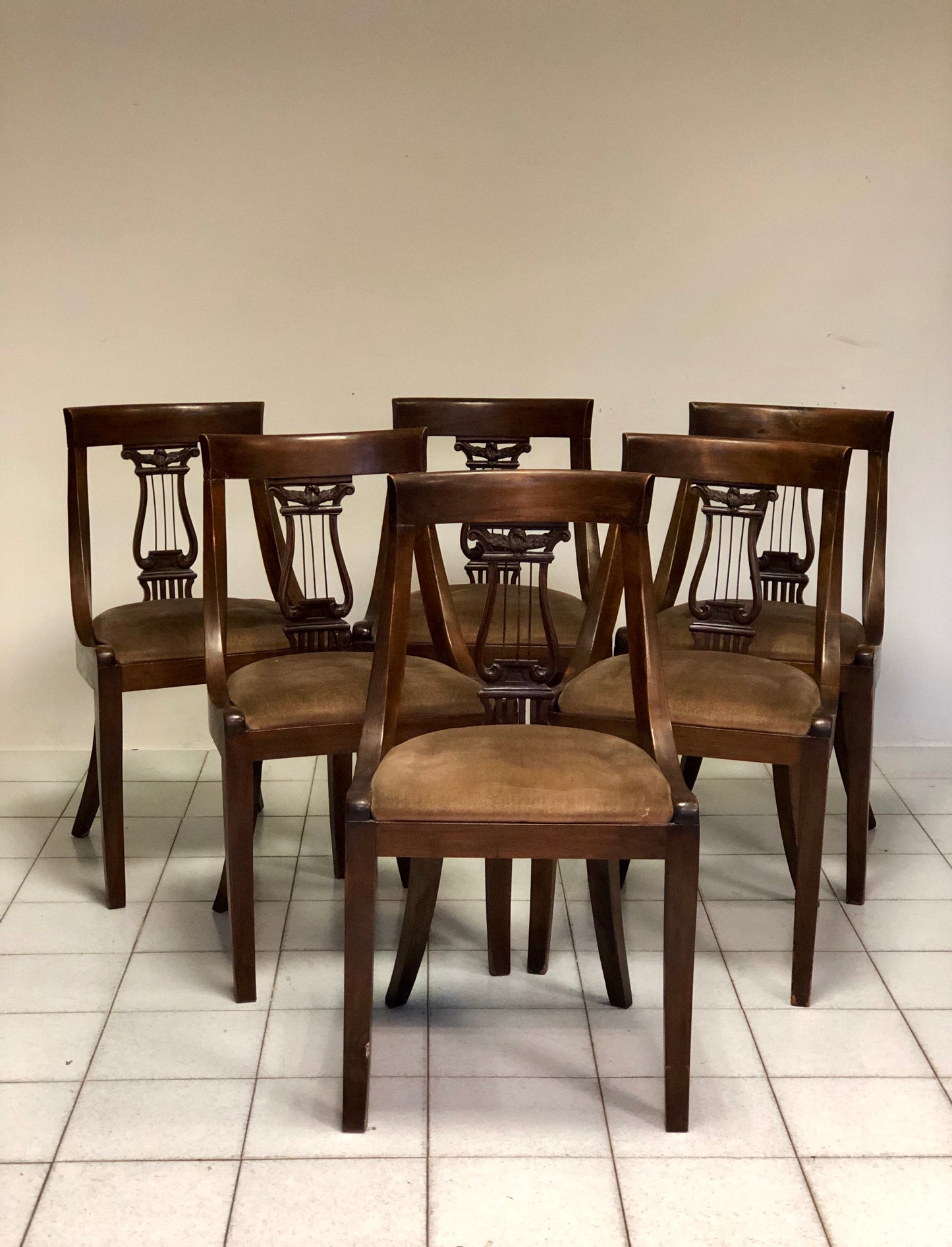 Group of six walnut chairs. Late 19th century