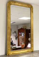 Specchiera lignea in foglia oro . Metà XIX secolo