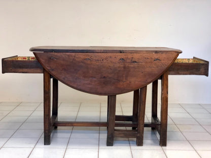 Walnut hinged table. 17th century