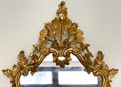 Specchiera in legno intagliato e dorato