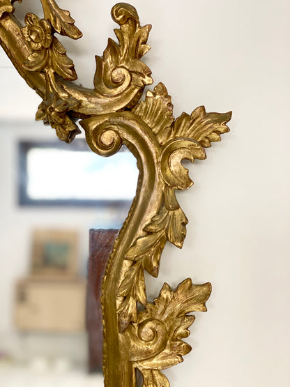 Specchiera in legno intagliato e dorato