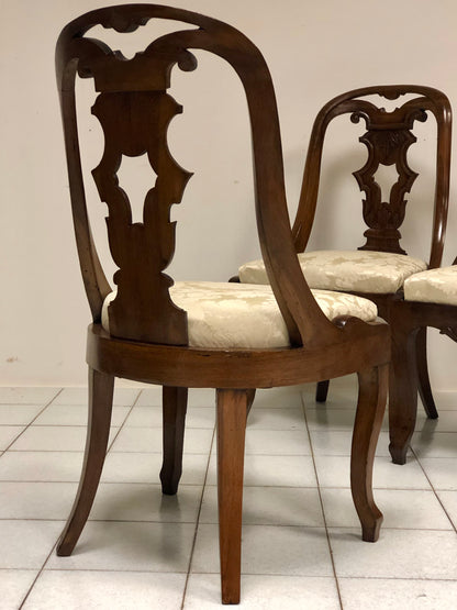 Group of four Charles X gondola chairs. Early 19th century