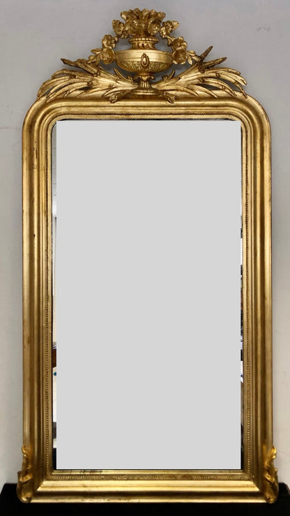 Gilded carved wooden mirror. 19th century