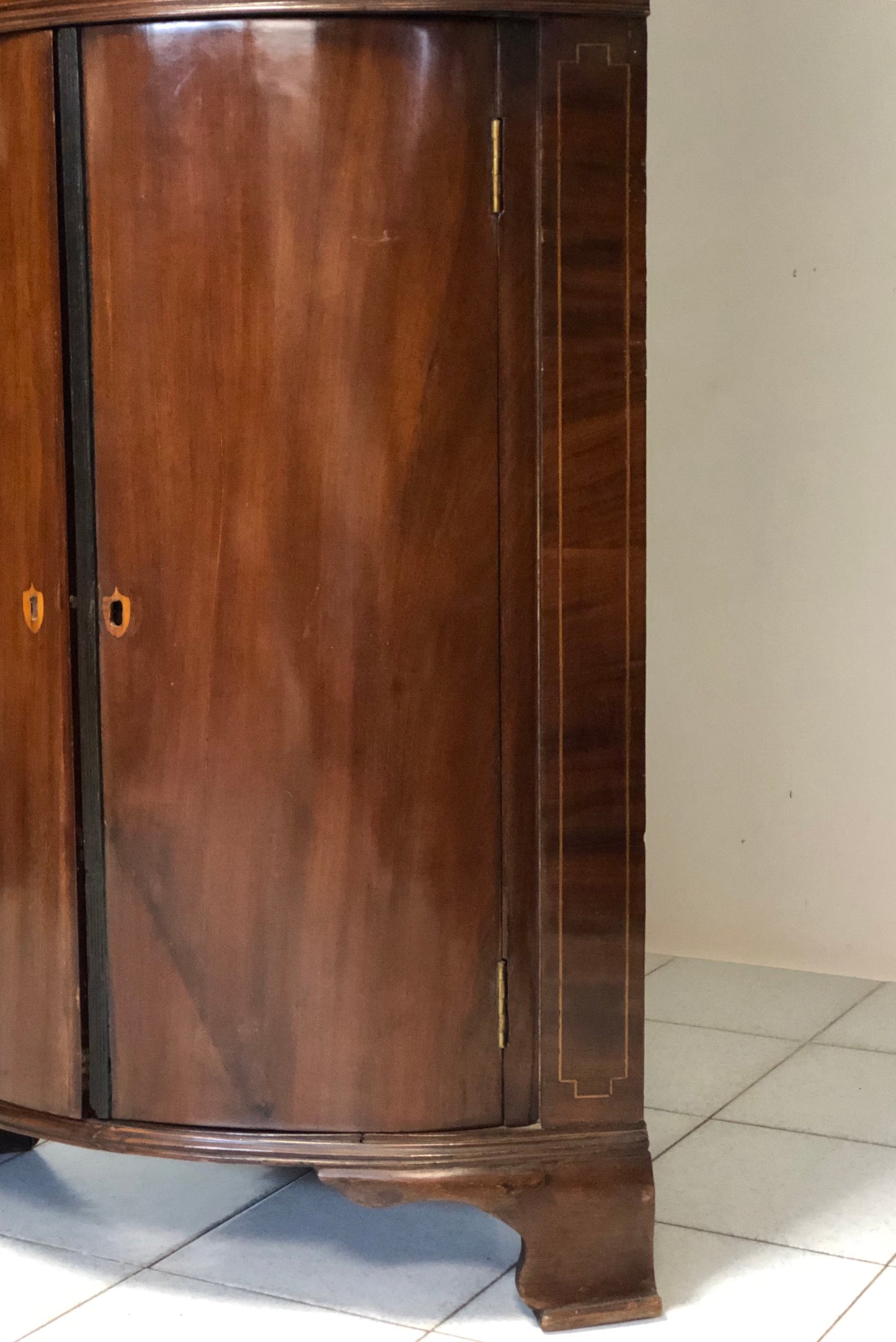 Inlaid curved corner cabinet, mid 19th century