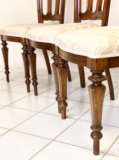 Group of four Lombard walnut chairs, mid-19th century