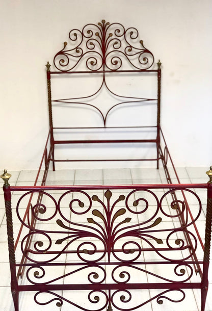 Wrought iron and lacquered and gilded bronze bed. Siena, early 19th century