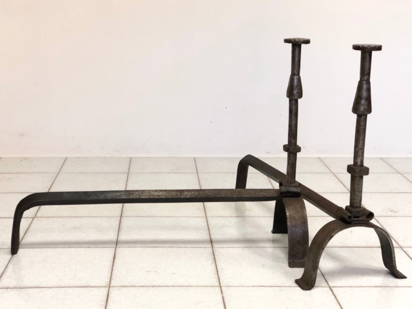 Pair of wrought iron andirons. 19th century