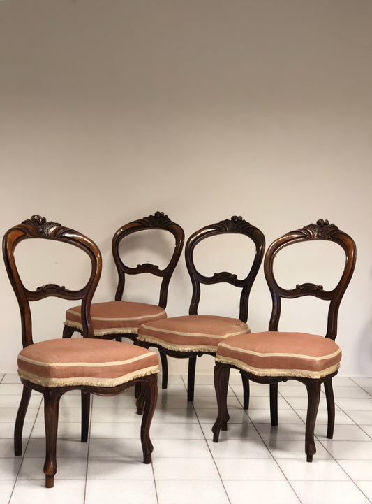 Group of four Louis Philippe walnut chairs
