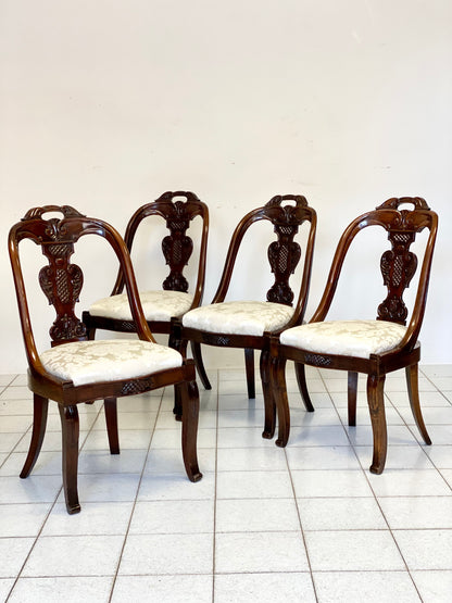 Group of four Lombard Charles X gondola empire chairs. Early 19th century
