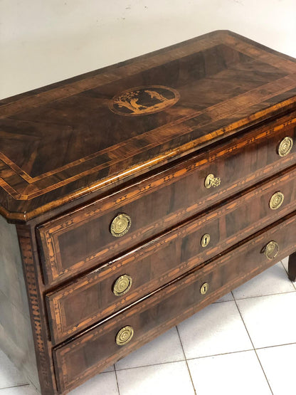 Louis XVI Lombard chest of drawers with figures. 18th century
