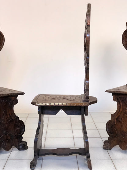 Group of three carved stools. 19th century