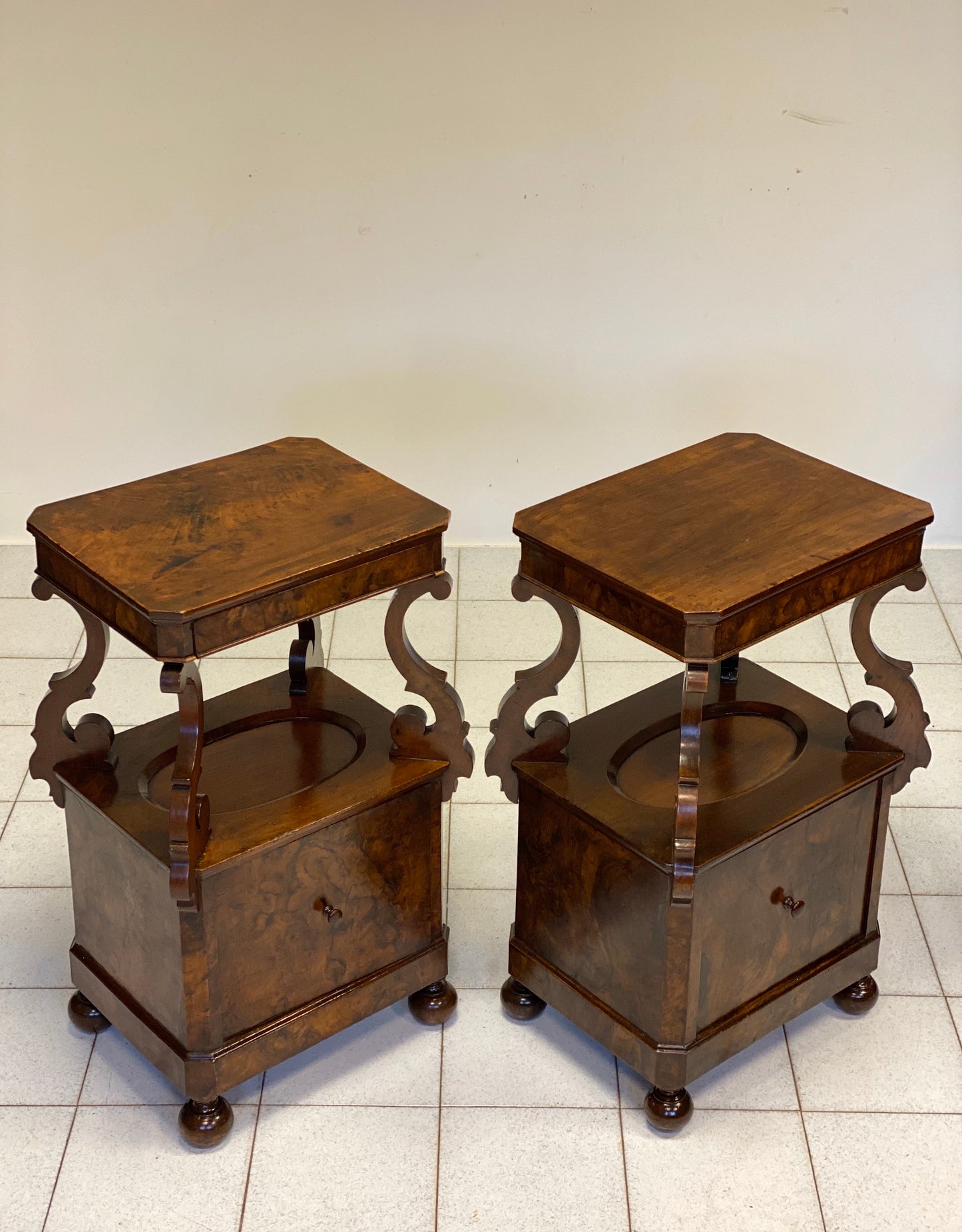 Pair of Lombardi Carlo X rooted centerpiece nightstands