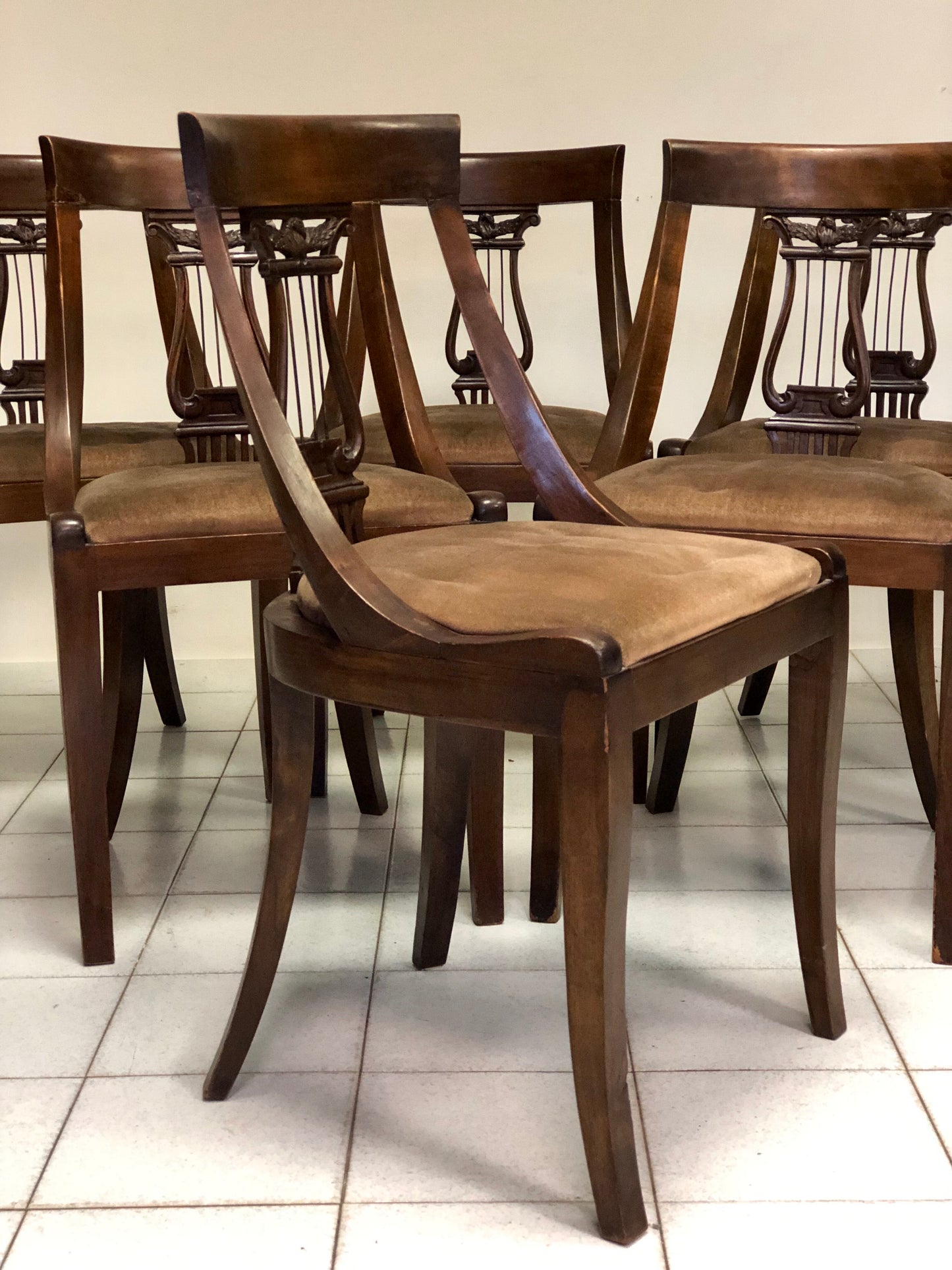 Group of six walnut chairs. Late 19th century