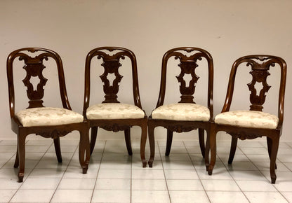 Group of four Charles X gondola chairs. Early 19th century