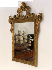 Specchiera intagliata e dorata . Venezia inizio XIX secolo