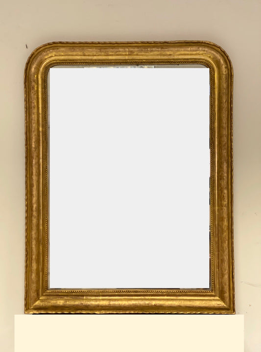 Specchiera Carlo X in foglia oro zecchino . XIX secolo . Restaurata