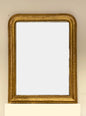 Charles X mirror in pure gold leaf. 19th century. Restored