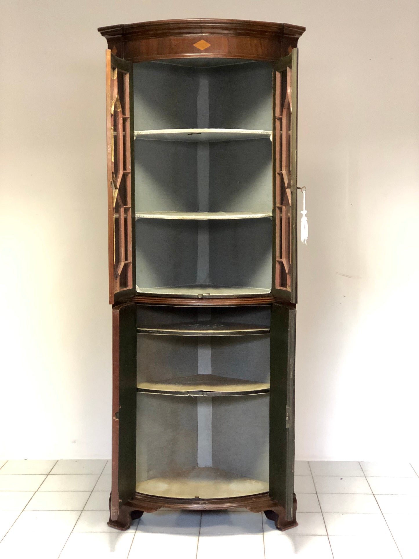 Inlaid curved corner cabinet, mid 19th century